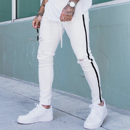 CALÇA BRANCA SKINNY LISTRA PRETA LATERAL / CORDÃO NO CÓS