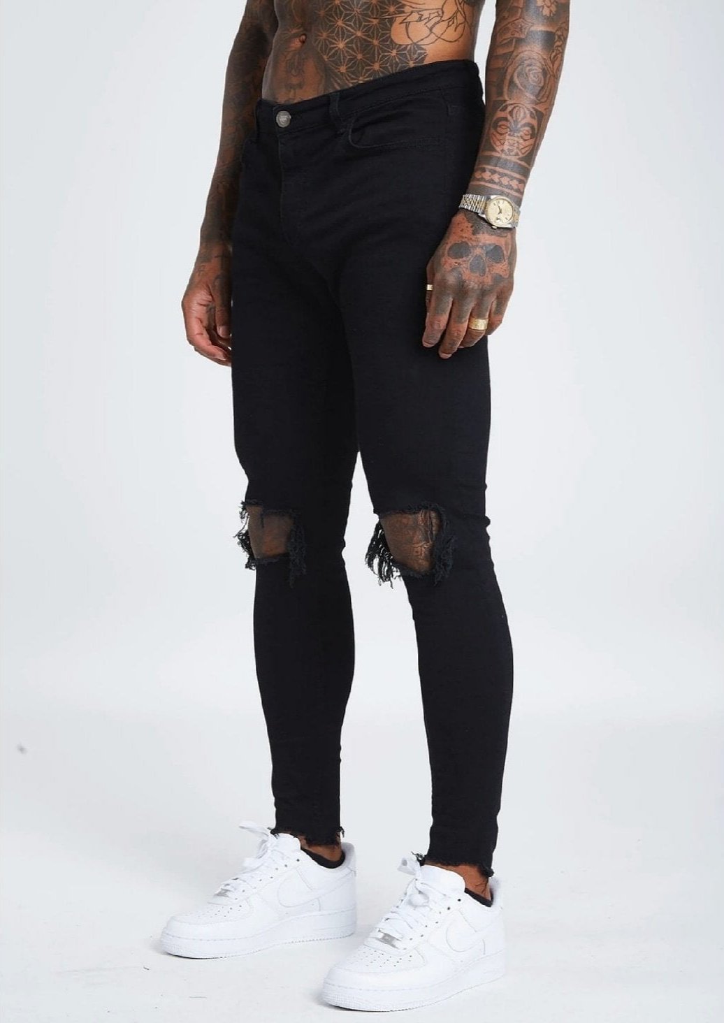 CALÇA JEANS ALL BLACK DESTRÓYED NO JOELHO / BARRA