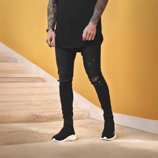 CALÇA JEANS SKINNY DESTRÓYED C/ ZÍPER NA BARRA
