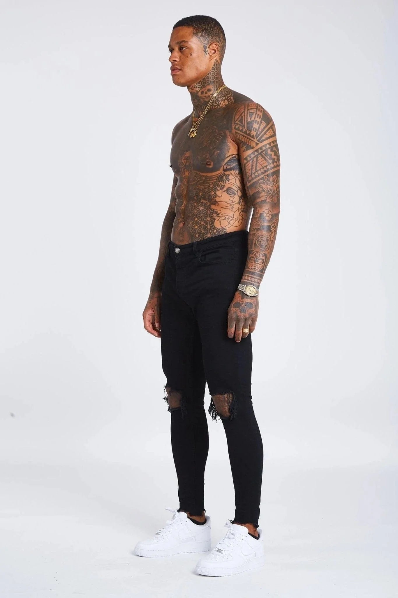 CALÇA JEANS ALL BLACK DESTRÓYED NO JOELHO / BARRA