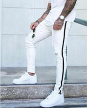 Carregar imagem no visualizador da galeria, CALÇA BRANCA SKINNY LISTRA PRETA LATERAL / CORDÃO NO CÓS
